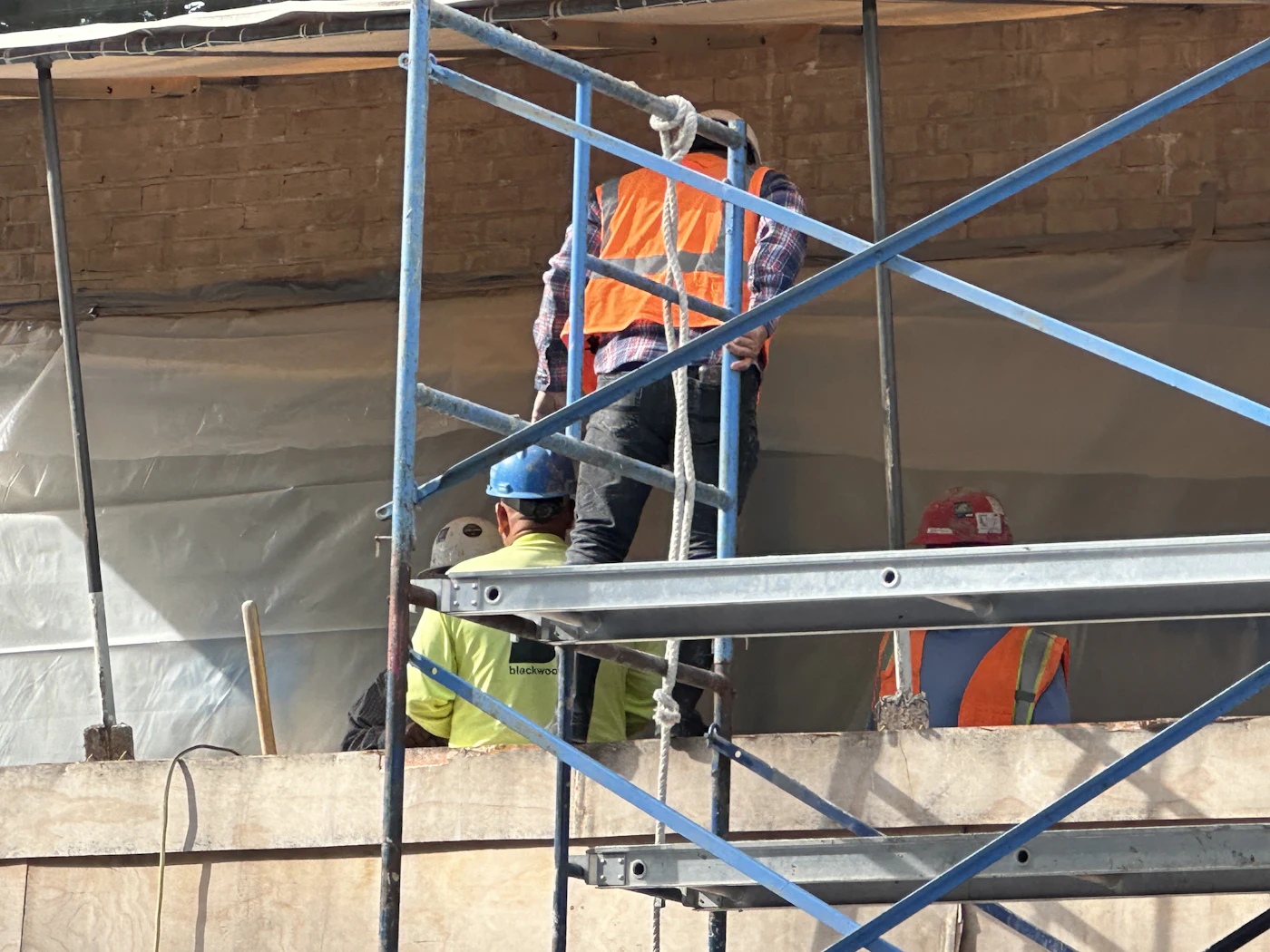 Installers working on scaffolding